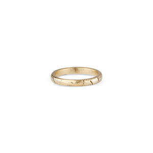 This is a super comfortable, stackable, 14k gold ring with the signature Natalie McMillan geometric texture around the band! It is handcrafted and made to order, making each one unique and one of a kind! It is perfect for every day wear and mixing and matching with other rings.